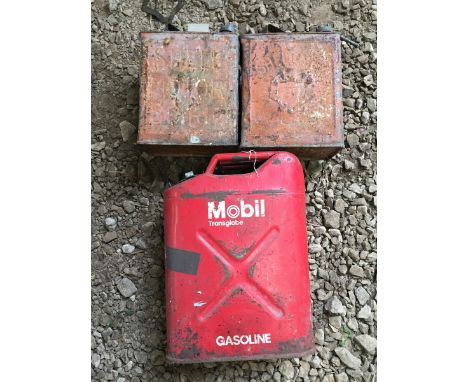 A Mobiloil Trans Globe Essolene can and two 2-gallon petrol cans, both Shell. 