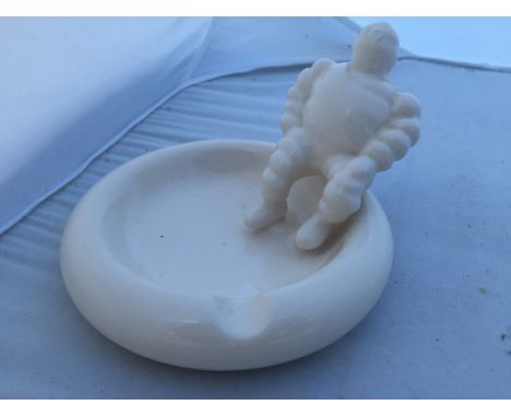 A Michelin Bibendum advertising ceramic ashtray.