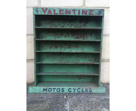 A Valentine Paints Motos Cycles metal shelf unit. 