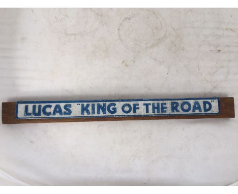 A Lucas King of the Road shelf strip mounted on wood. 