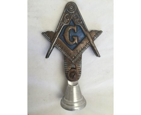 An unusual Masonic car badge.