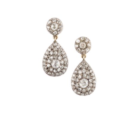 A pair of diamond ear pendants, each designed as a circular cluster of old and single-cut diamonds, suspending a similarly se