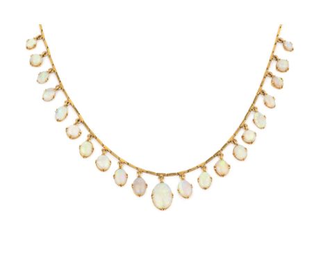 An opal fringe necklace, set with twenty one graduated cabochon oval opals suspended from an unmarked yellow precious metal b