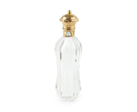 A 19th century French gold mounted glass scent bottle, of waisted and faceted form, the hinged cover engraved with scrolling 