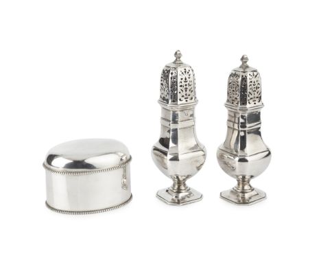 A Dutch silver oval tea caddy, with beaded borders and hinged domed cover, 9.5cm wide, and a pair of Dutch silver sugar casto