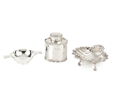 An Edwardian silver oval tea caddy and cover, with scroll decorated borders by Horace Woodward &amp; Co. Ltd, London 1902, 9c