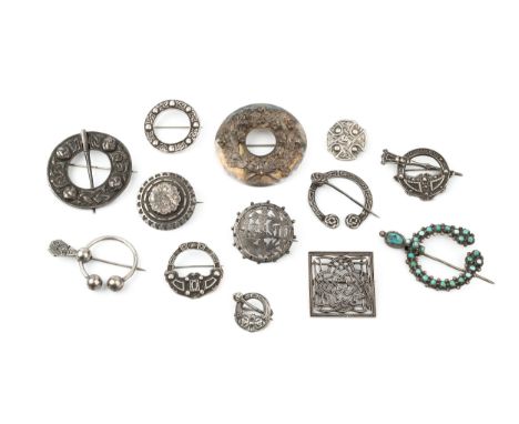 A collection of five silver circular Celtic design brooches, modelled as cloak pins, three further similar silver circular br