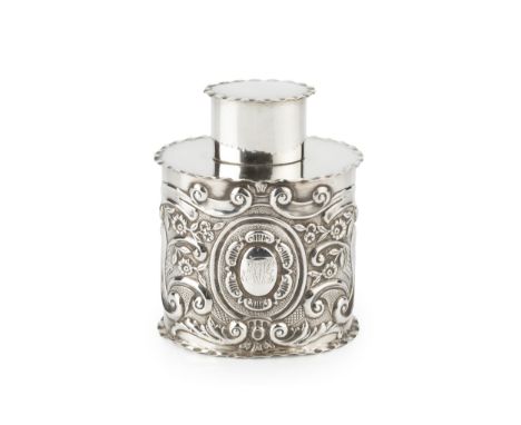 A late Victorian silver oval tea caddy and cover, repoussé decorated with flowers and scrollwork by Josiah Williams &amp; Co,