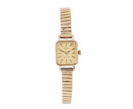 A 9ct gold lady's Rotary wristwatch, the rectangular dial with baton numerals and having quartz movement, on flexible bracele