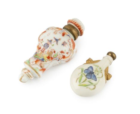 A late 19th century porcelain scent bottle, of oval flask form, painted to each side with a butterfly and grasses on a cream 