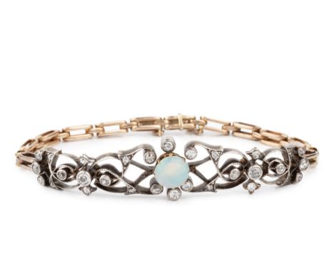 An opal and diamond set panel bracelet, featuring ornate arabesque scroll work in white metal, scattered with bezel and pave 