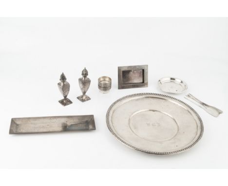 An American silver plate, with gadrooned border, stamped sterling, 26cm wide, and assorted American silver small items compri