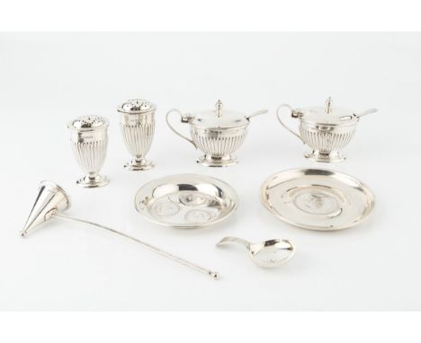 A collection of silver, comprising a George III caddy spoon with bright-cut decoration, maker I.T, Birmingham 1807, 7cm, a fo