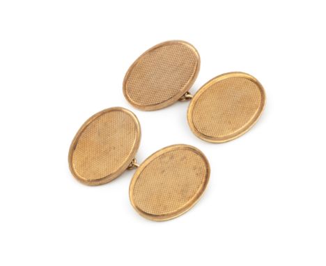 A pair of 9ct gold oval cufflinks, with engine turned decoration. (2)approx 5.1g overall