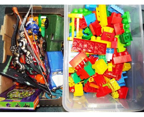 Two boxes containing a large quantity of children's toys to include a box of Mega Bloks and a mixed box containing  model car