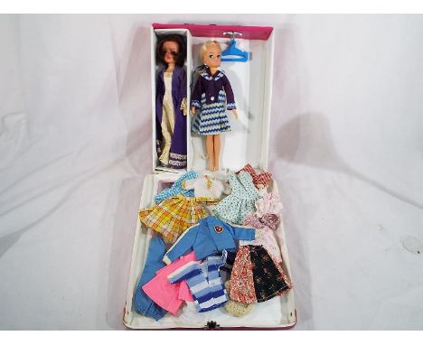Vintage Sindy Carry case containing 2 Active Sindy dolls with clothes from 1970's including wavy navy and lovely lively and c