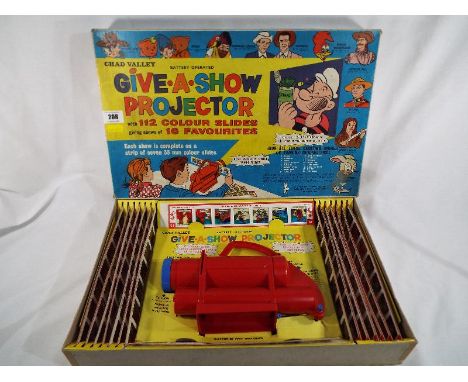 A Chad Valley battery operated Give-a-Show projector with 112 colour slides giving shows of 16 favourites including Popeye, C