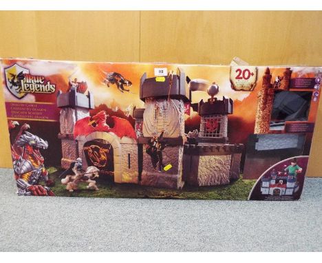 A True Legends Dragon castle with light and sound effects, boxed