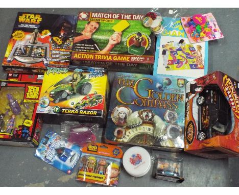 A mixed lot to include sealed blister packs and board games to include Monsters Garage, Star Wars, The Golden Compass, Bob th