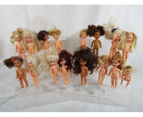 A collection of sixteen miniature dolls some marked Mattel 1994