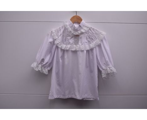 Four 1970s Cobannau white cotton blouses, from the Welsh factory known for the style, which closed in 1980. Each button down 