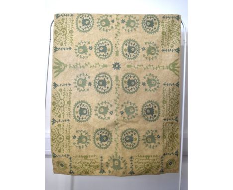 An Indian Crewel work carpet / area rug in beige and khaki greens, having floral repeat pattern throughout. Measures 35x60', 