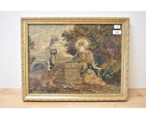 A framed antique embroidery on silk depicting Christ with Mary Magdelane at a wishing/water well, in a gold metal frame, 14x1