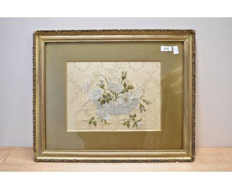 20th century embroidery of flowers arranged in a bowl, on gold jacquard fabric, in a bronze-effect painted frame. Overall mea