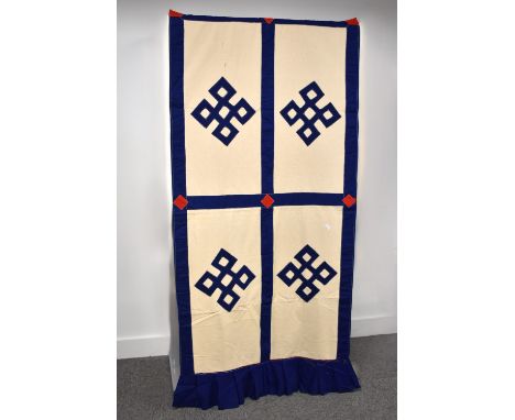 Four Tibetan banners or door curtains, in natural cotton canvas, two bearing the endless knot symbol in navy applique, two ha
