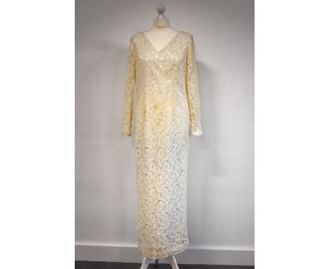 A collection of ladies occasional dressing items, comprising: A cream lace wedding or evening dress, V-neck with a zip fasten