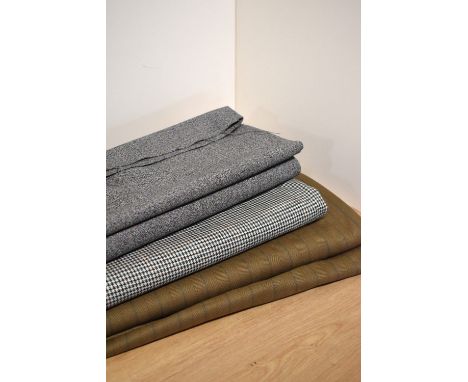 Three bolts of vintage tailor's fabric, including a wool houndstooth in teal and brown, a grey marl both Made In Huddersfield