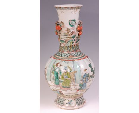 A Chinese famille vert lobed bottle vase, enamel decorated with figure landscape scenes within borders, the neck with applied