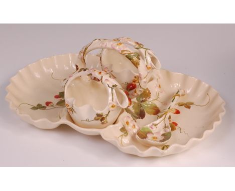 A George Jones & Son pottery strawberry dish, having two baskets and ladle, each with moulded decoration, impressed mark vers