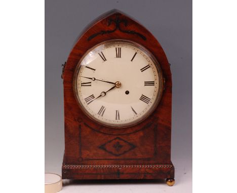 A late Regency mahogany and brass inlaid bracket clock, the unsigned convex white enamel dial (re-painted) having a single wi