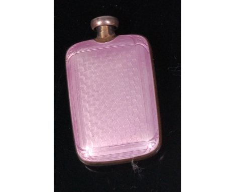 A guilloche pink enamel on white metal scent bottle, having screw cap, 4.5cm 