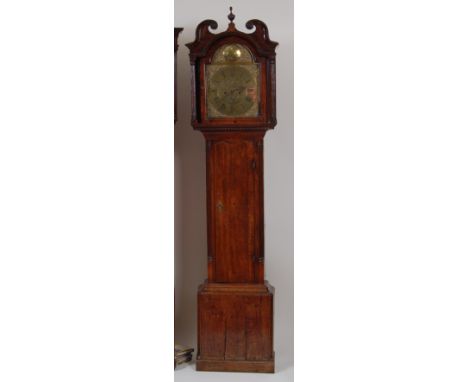 Morris Thomas of Carnarvon late 18th century oak cased longcase clock, having an arched brass dial (w.12"), signed to the arc