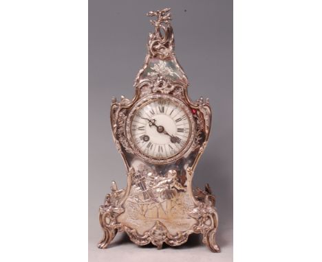 A late Victorian Scottish silver balloon shaped mantel clock, having convex white enamel dial with Roman and Arabic numerals,