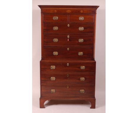 A George III mahogany chest-on-chest, the upper section having a moulded cornice above two short over three long graduated dr
