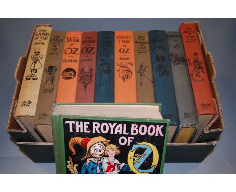 BOX, BAUM L. Frank, eleven Oz books including two by Ruth Plumly Thomson, undated, all 8vo published by Reilly and Lee Chicag