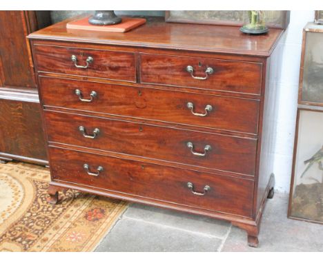 A Georgian mahogany chest of drawers having bras loop handles and ogee bracket feet. W125cm D56cm H103cm.