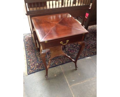 An Edwardian envelope mahogany card table. W57cm D57cm H74cm