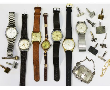 A mixed lot comprising 7 wristwatches, a 9ct gold bracelet wt. 1.5g, silver cufflinks and a silver decanter label.