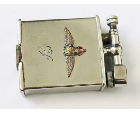 A Parker Beacon silver plated lighter having applied RAF motif to front, length 5cm.