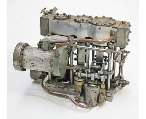 A scratch built live steam tripple cylinder marine engine, length 24cm. 