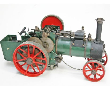A scratch built live steam Fowler type single cylinder agricultural tractor engine painted in red and green, length 38cm. 