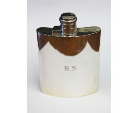 A hallmarked silver hip flask, length 12.5cm, wt. 6oz.