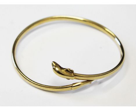 A 9ct gold bangle, wt. 5.6g.
