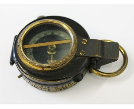 A Sinclair compass, length 8cm.