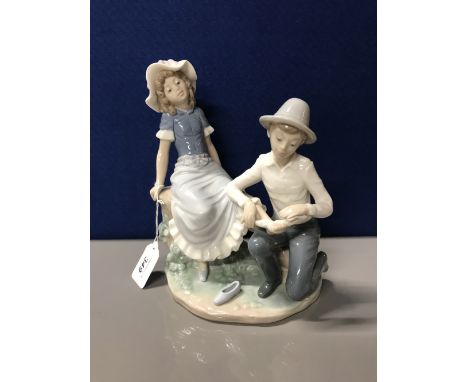 LARGE NAO FIG GIRL WITH BANDAGED FOOT