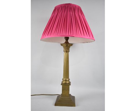 A Brass Table Lamp in the From of a Reeded Corinthian Column on Stepped Square Base, Complete with Shade, 66cms High 